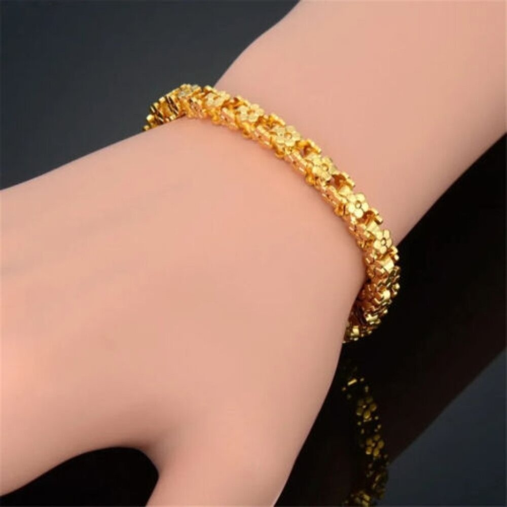 14k yellow gold plated flower all around tennis bracelet 7” long